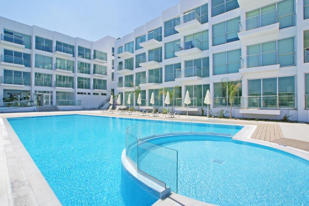 Апарт-отель Coralli Beachfront